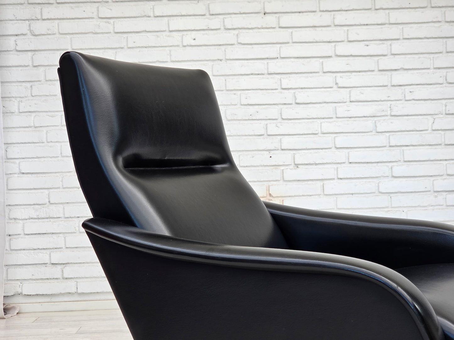 1970s, Danish armchair, black artificial leather, teak wood legs.