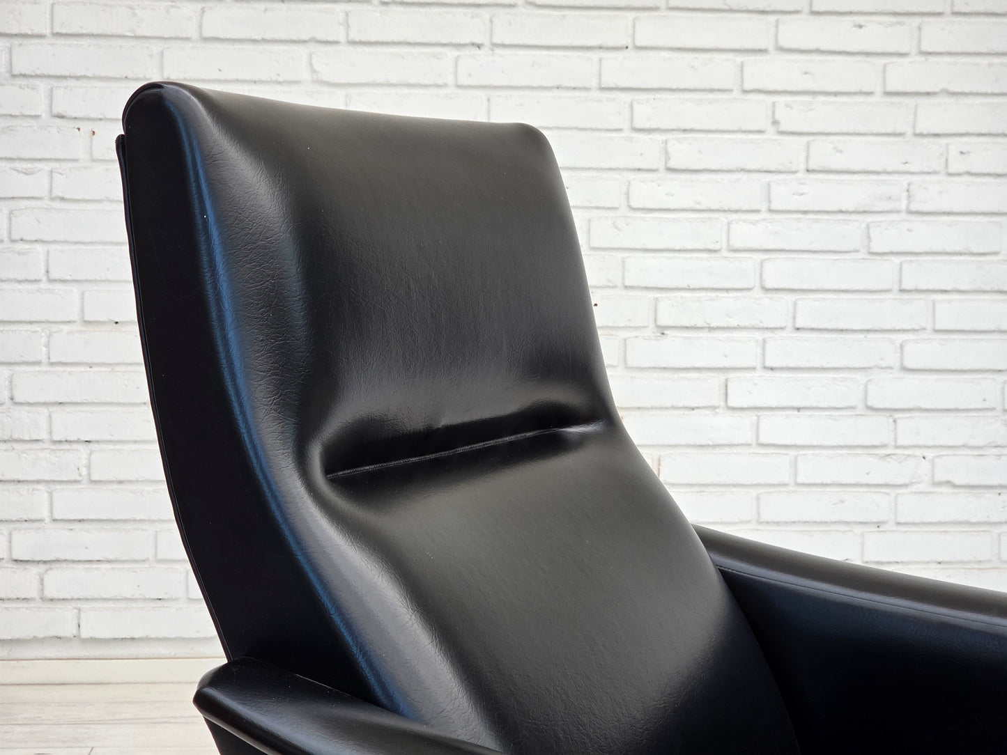 1970s, Danish armchair, black artificial leather, teak wood legs.