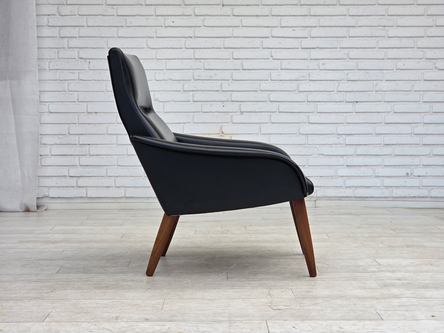 1970s, Danish armchair, black artificial leather, teak wood legs.