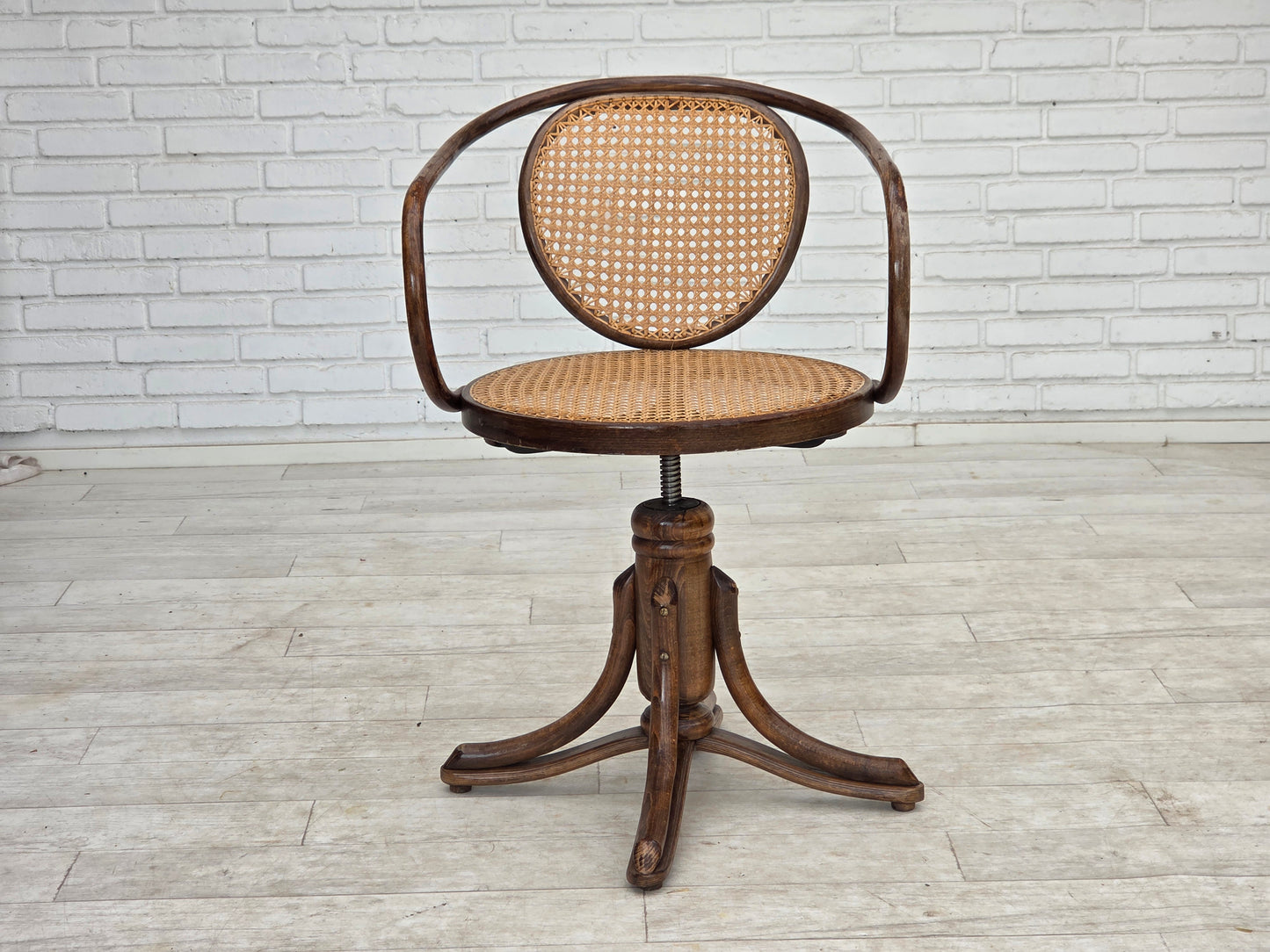 1950s, adjustable swivel armchair in Thonet style.