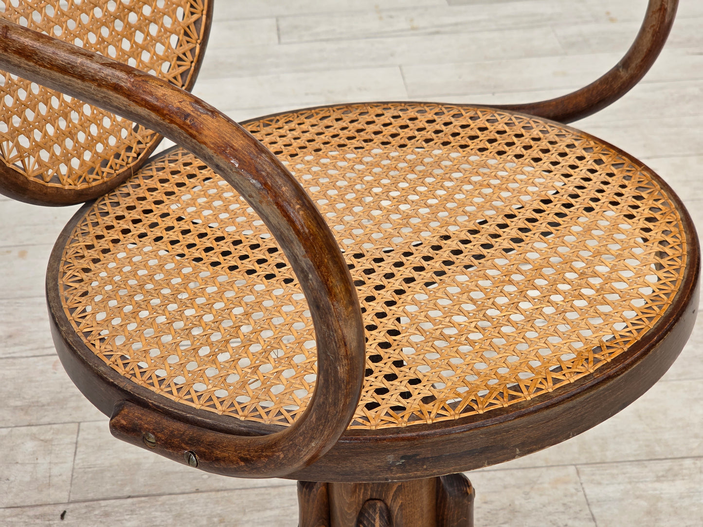 1950s, adjustable swivel armchair in Thonet style.