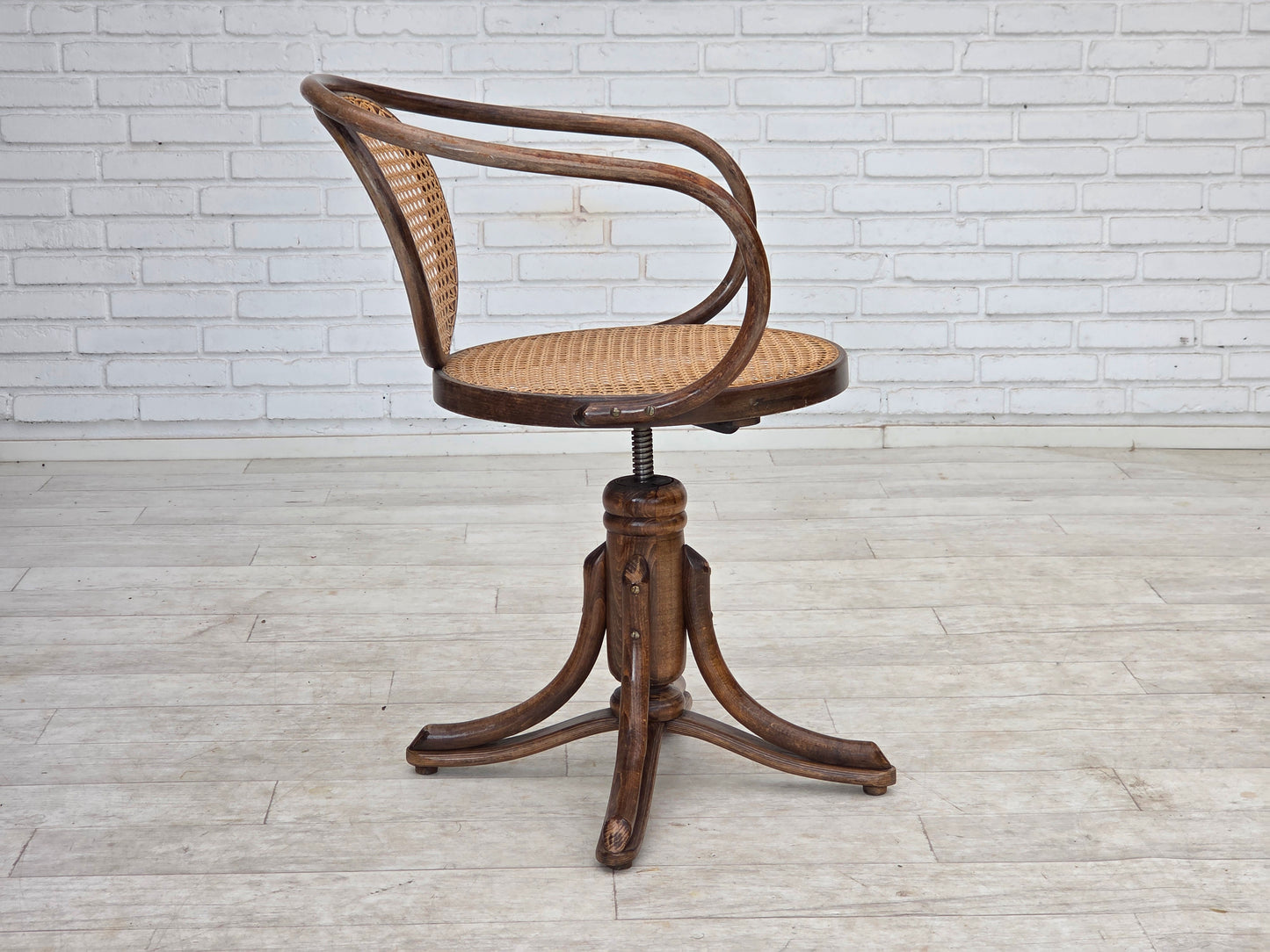 1950s, adjustable swivel armchair in Thonet style.