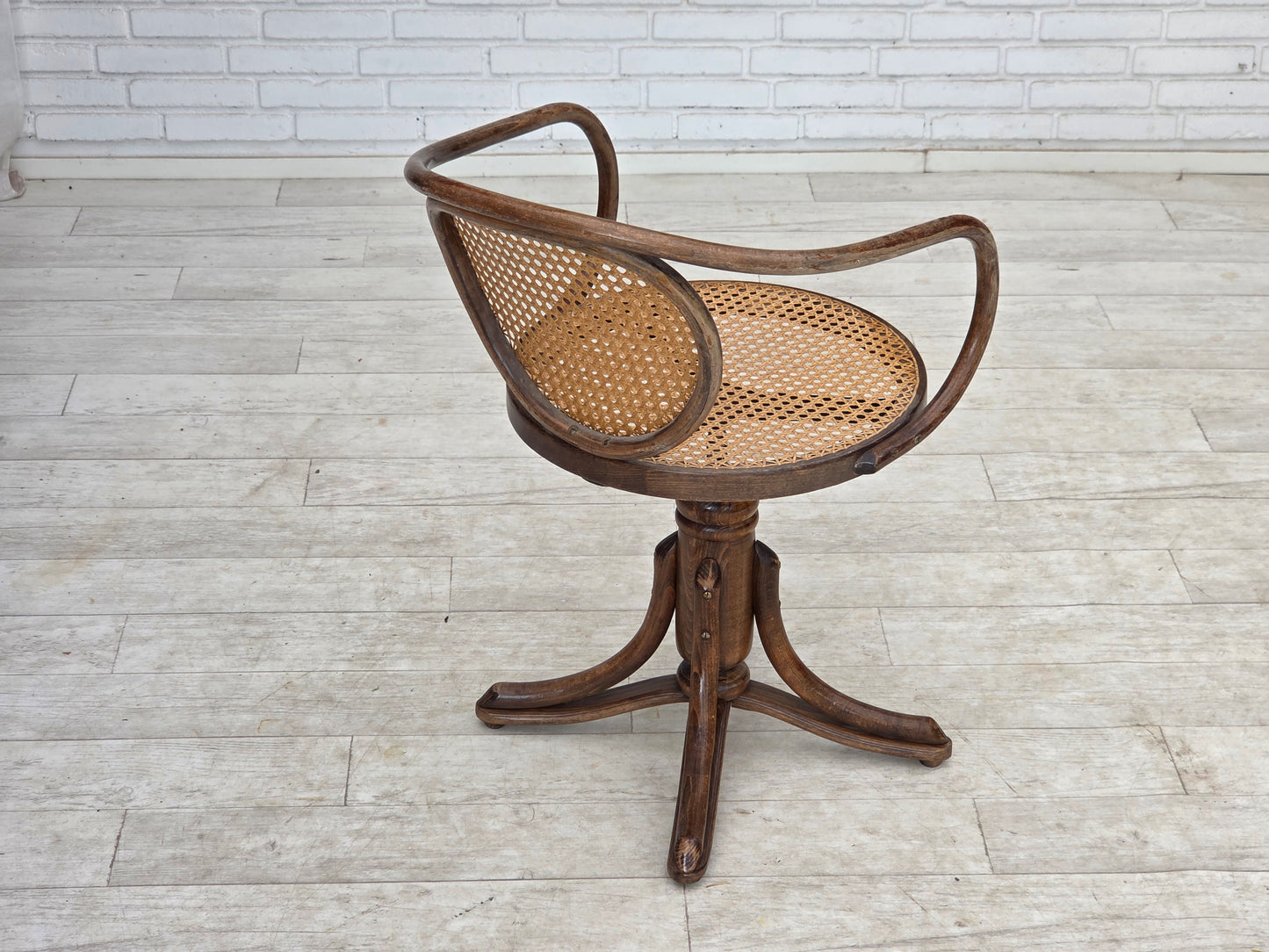 1950s, adjustable swivel armchair in Thonet style.
