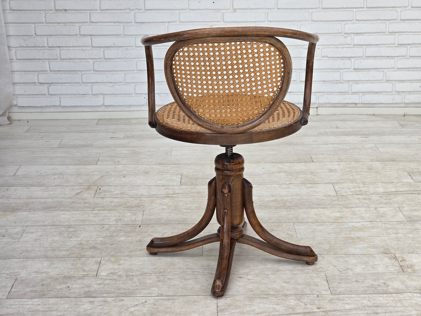 1950s, adjustable swivel armchair in Thonet style.