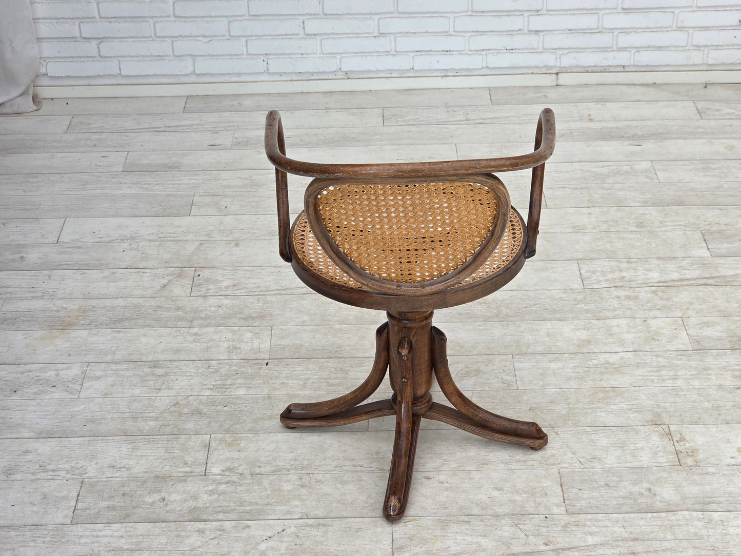 1950s, adjustable swivel armchair in Thonet style.