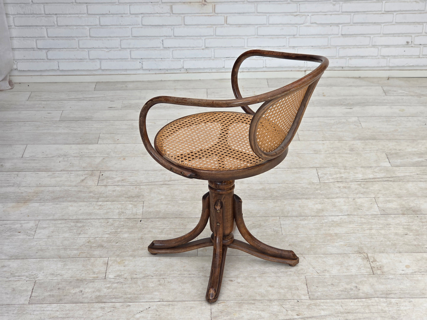 1950s, adjustable swivel armchair in Thonet style.