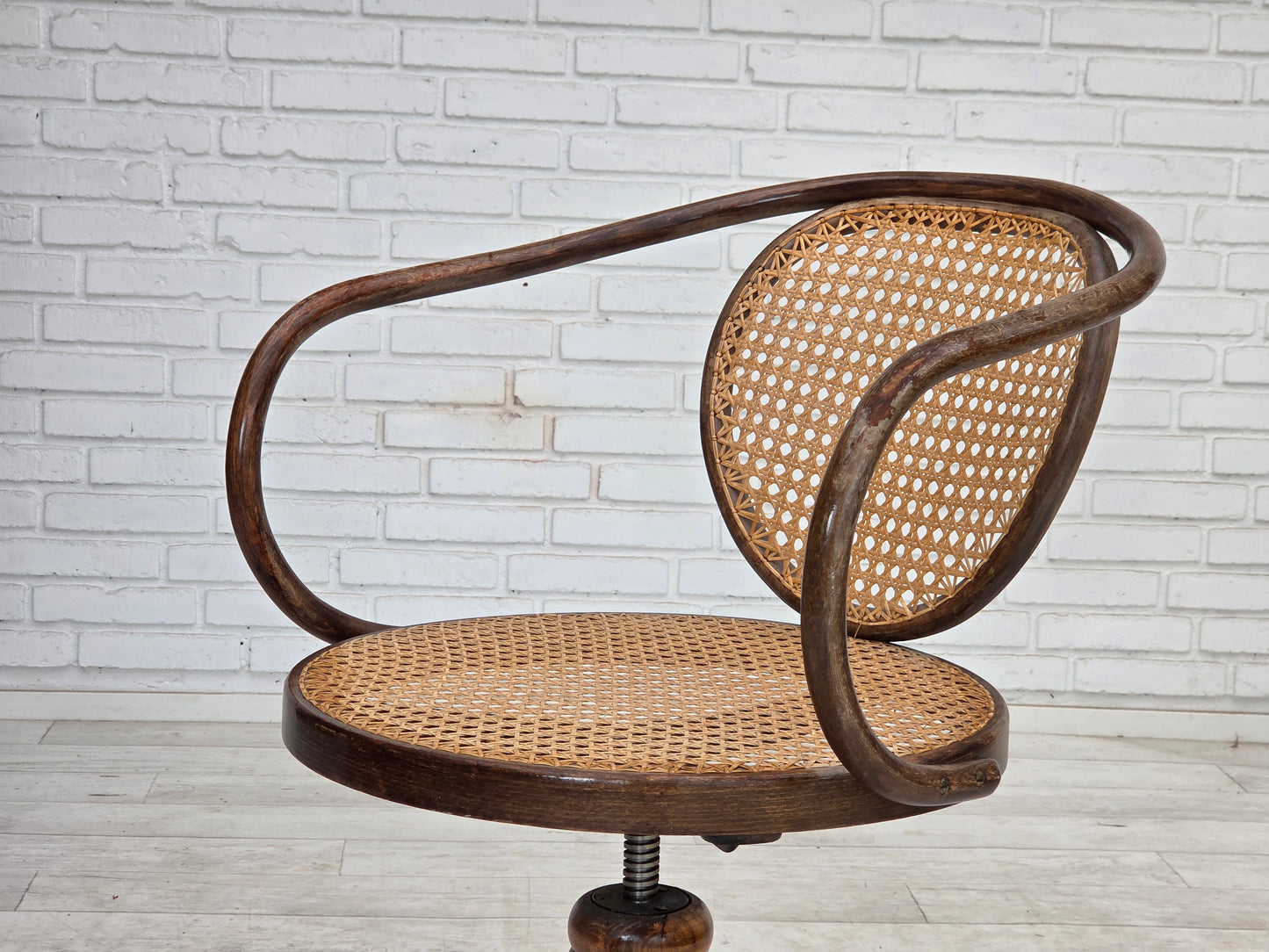 1950s, adjustable swivel armchair in Thonet style.