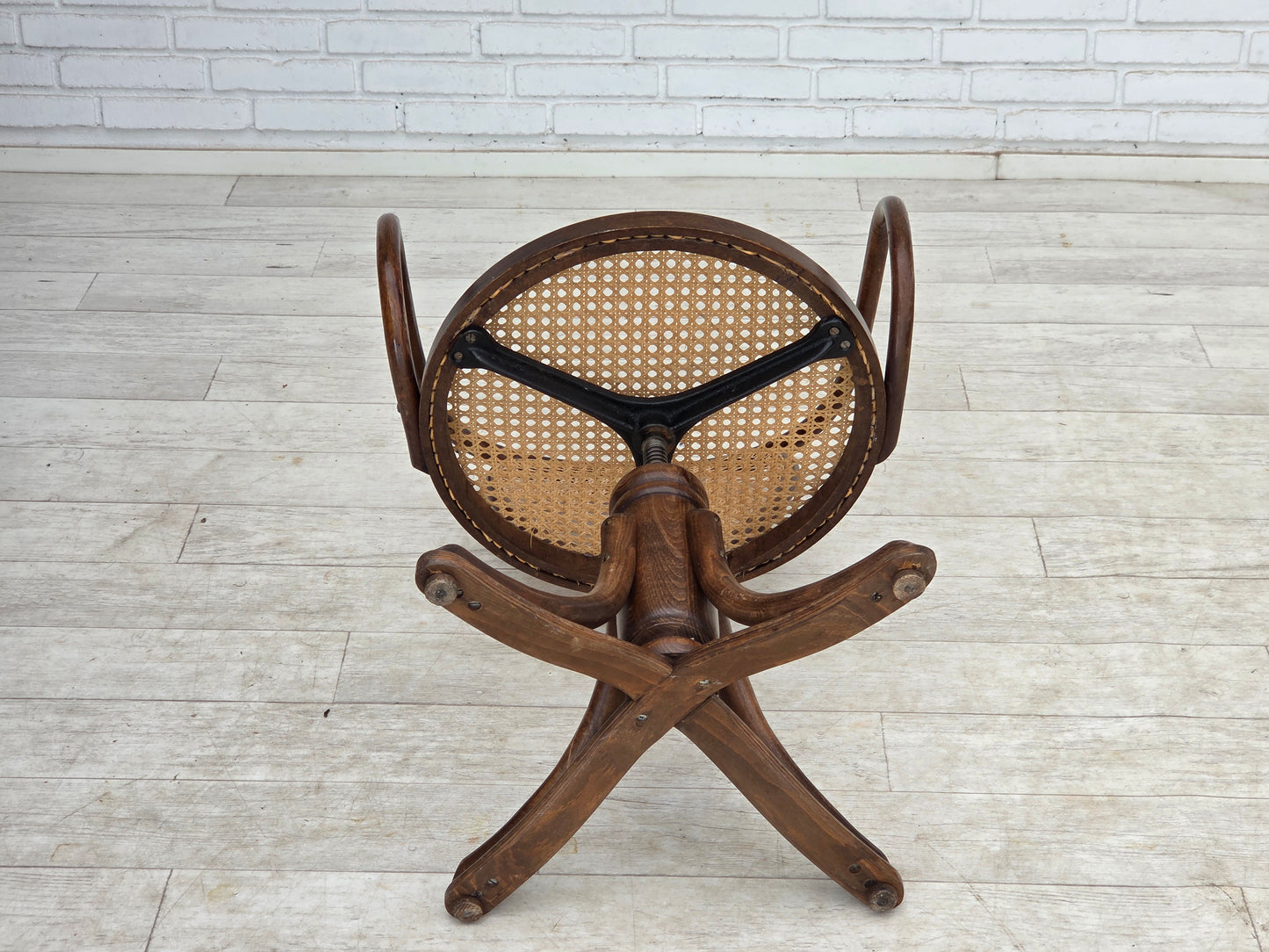 1950s, adjustable swivel armchair in Thonet style.