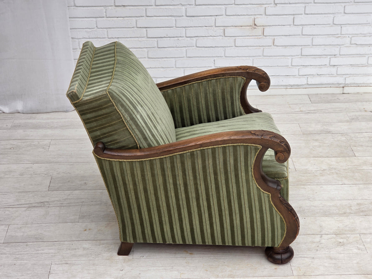 1950s, Danish relax armchair, green furniture velour, carved oak wood.