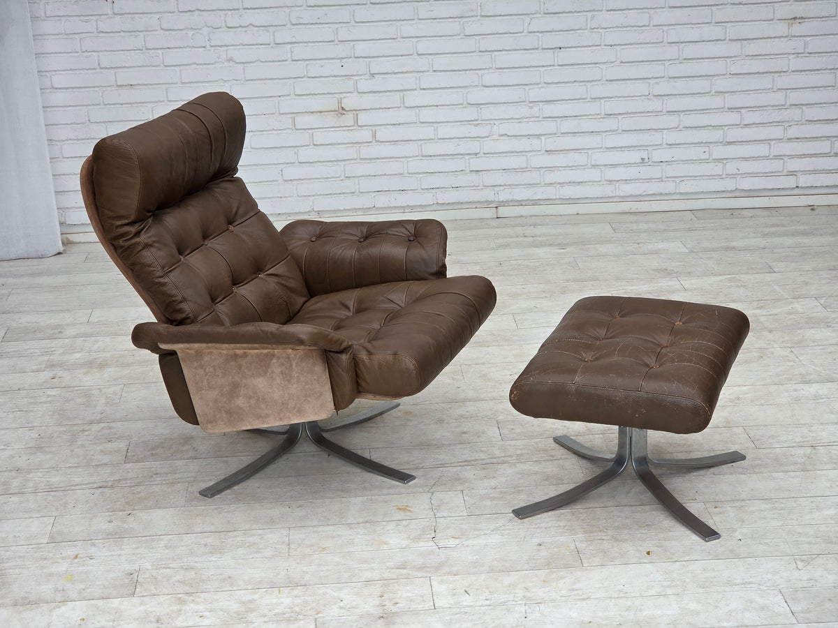 1970s, Danish swivel armchair with footstool, leather, stainless steel.