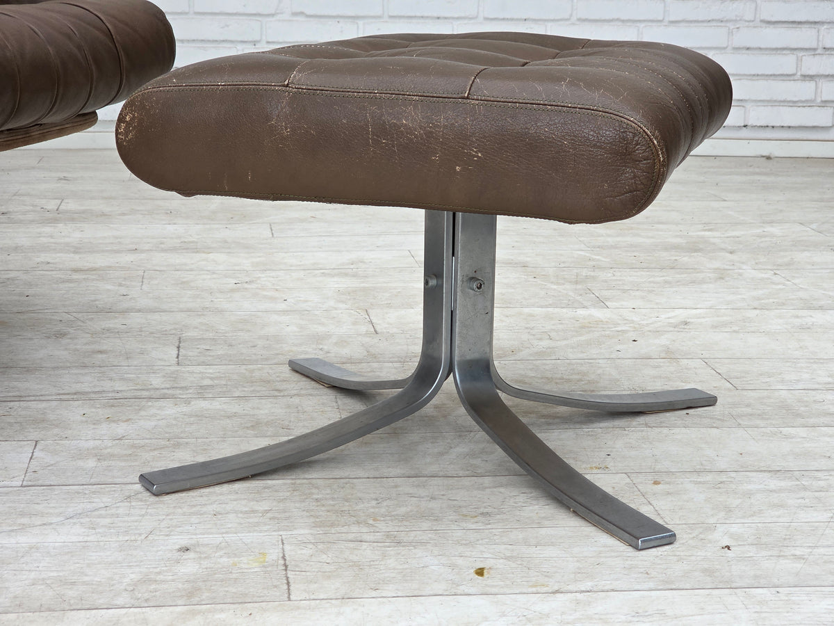 1970s, Danish swivel armchair with footstool, leather, stainless steel.