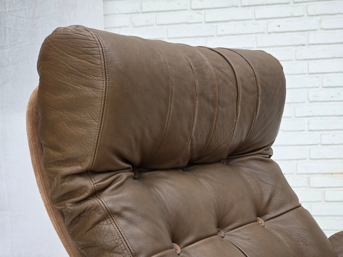 1970s, Danish swivel armchair with footstool, leather, stainless steel.