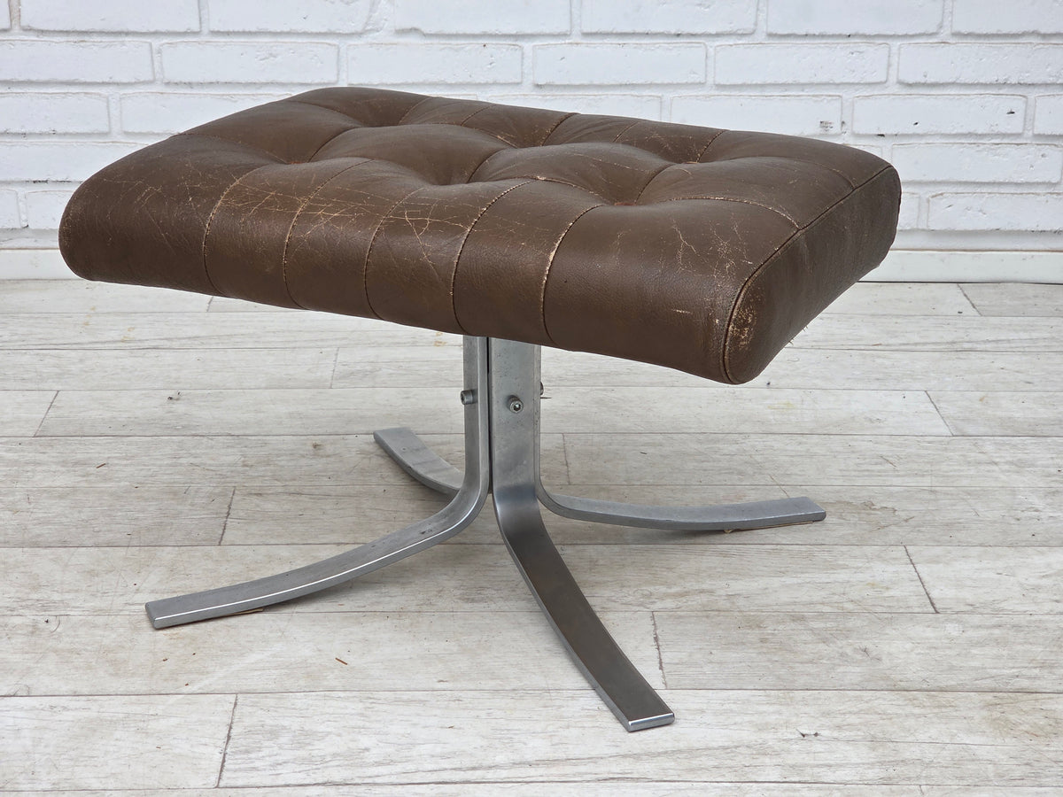 1970s, Danish swivel armchair with footstool, leather, stainless steel.