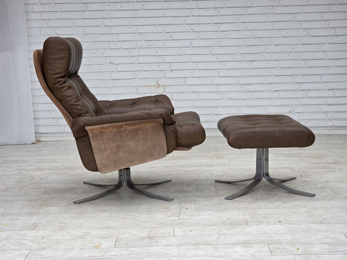 1970s, Danish swivel armchair with footstool, leather, stainless steel.