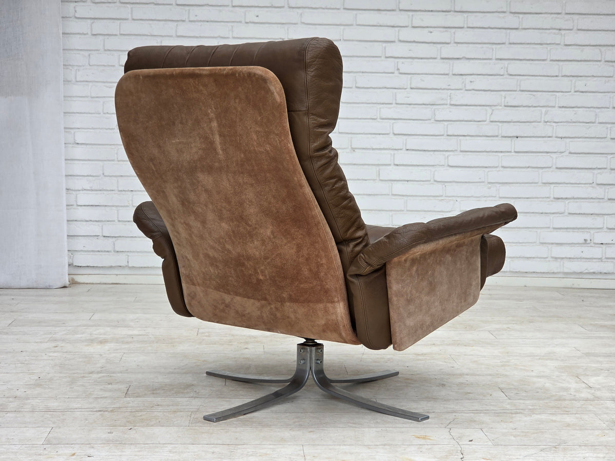 1970s, Danish swivel armchair with footstool, leather, stainless steel.