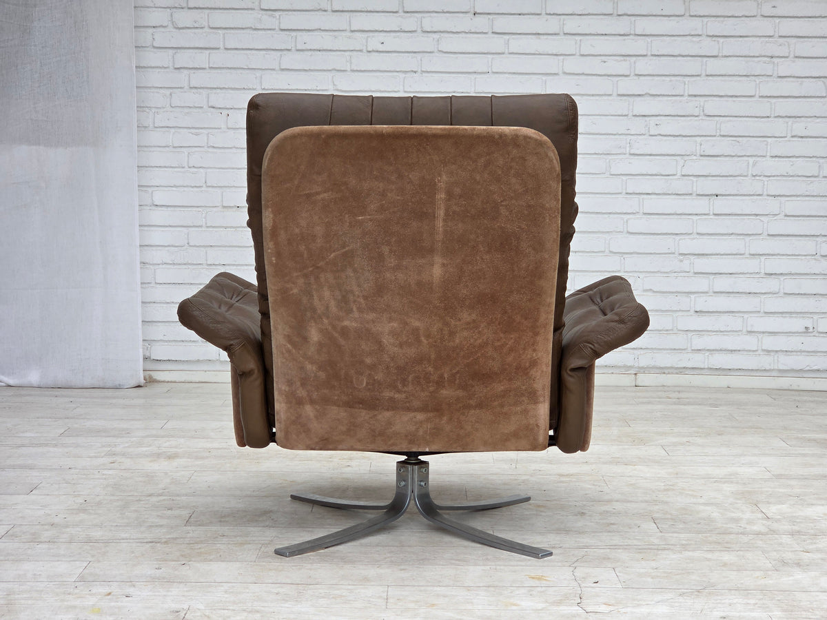 1970s, Danish swivel armchair with footstool, leather, stainless steel.