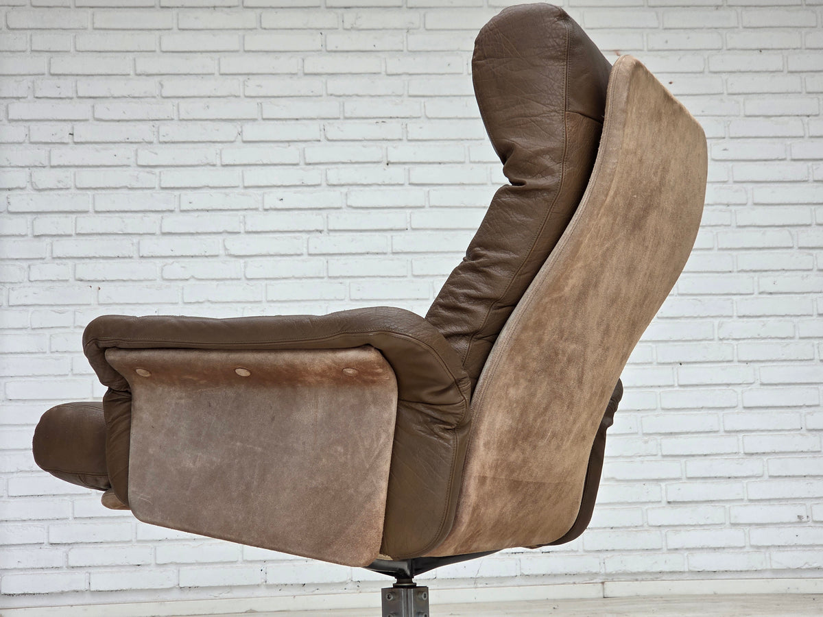 1970s, Danish swivel armchair with footstool, leather, stainless steel.