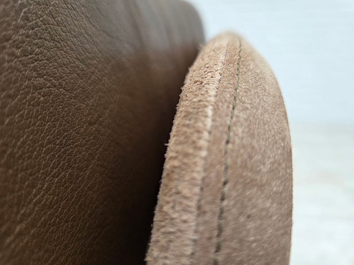 1970s, Danish swivel armchair with footstool, leather, stainless steel.