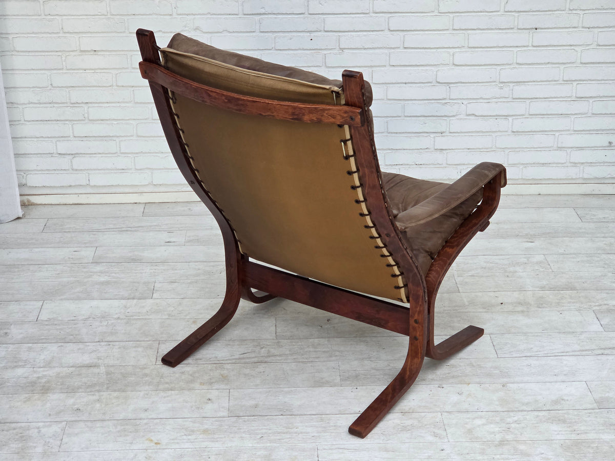 1970s, Norwegian design by Ingmar Relling, chair model "Siesta" with footstool.