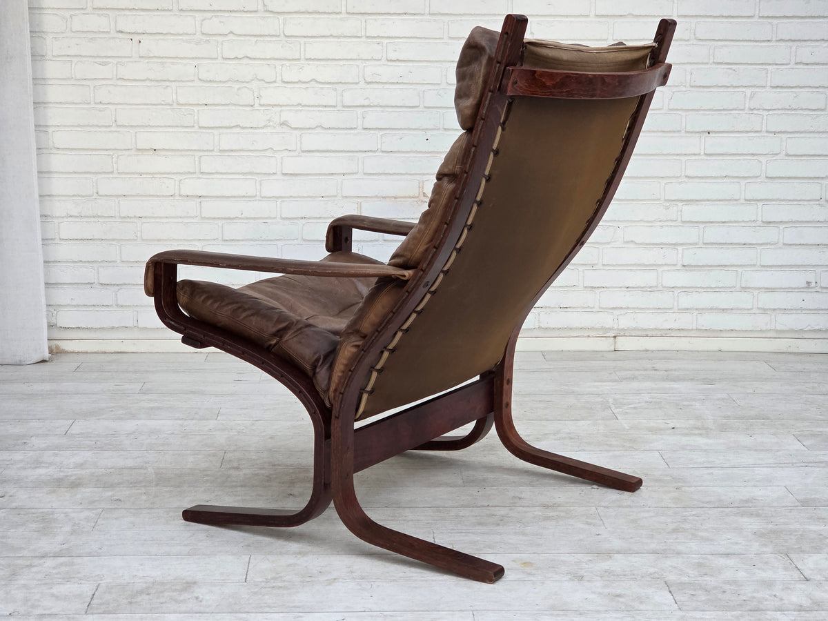 1970s, Norwegian design by Ingmar Relling, chair model "Siesta" with footstool.