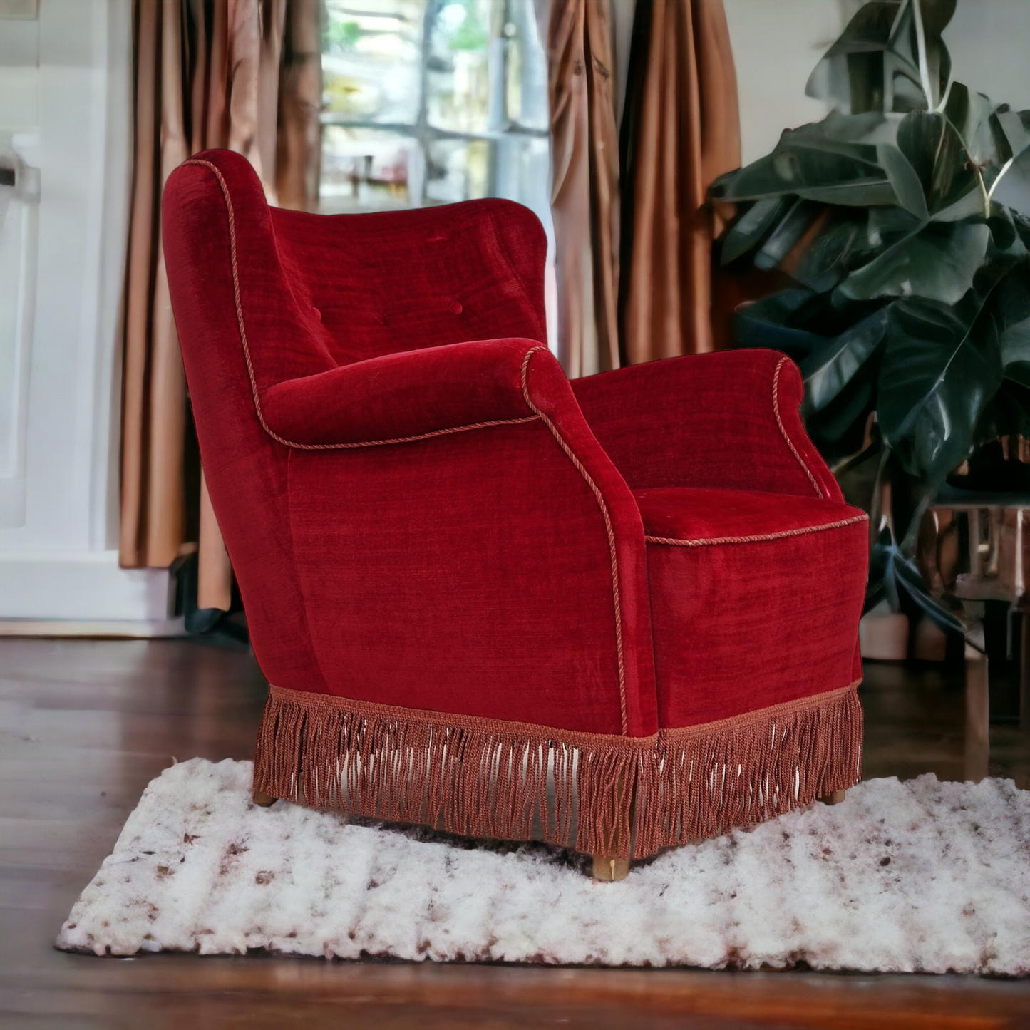 1960s, Danish vintage armchair in cherry-red velvet.