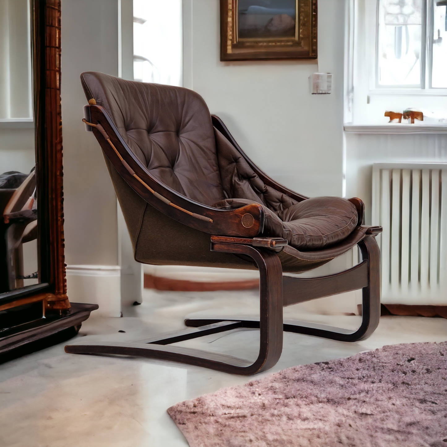 1970s, brown leather lounge chair by Ake Fribytter for Nelo Sweden.