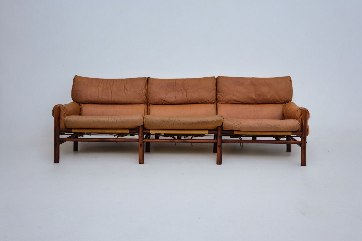 1960s, Scandinavian design by Arne Norell, sofa, model "Kontiki", original condition, leather, beech wood.