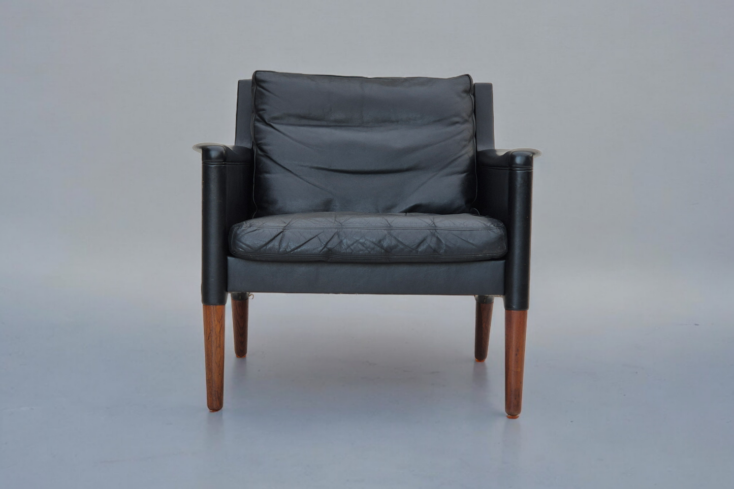 1960s, Danish design by Kurt Østervig, lounge chair model 55, leather, rosewood legs, original condition.